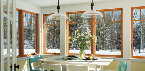 The large expanse of Andersen Windows in this kitchen connect the space to the outdoors