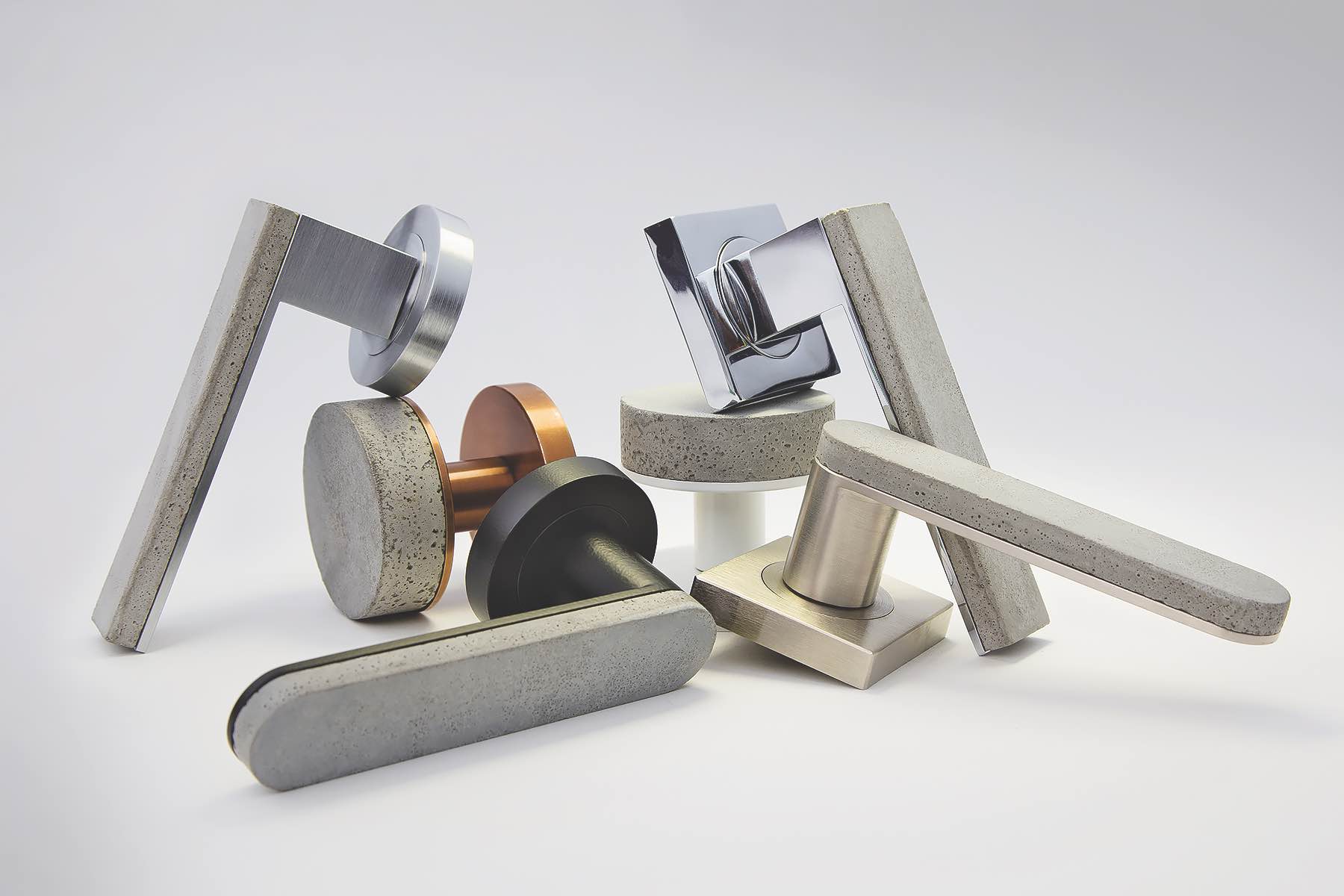 The Bullet & Stone Collection from Australian company Designer Doorware marries concrete and metal in door handles and round knob profiles, melding hot and cold aesthetics and offering a unique tactile experience. The solid brass fittings that back each concrete form are finished in either Florentine Bronze (in a Medium or Dark tone), Polished Nickel, or Satin Black Chrome. Custom finishes for the concrete are available by request.