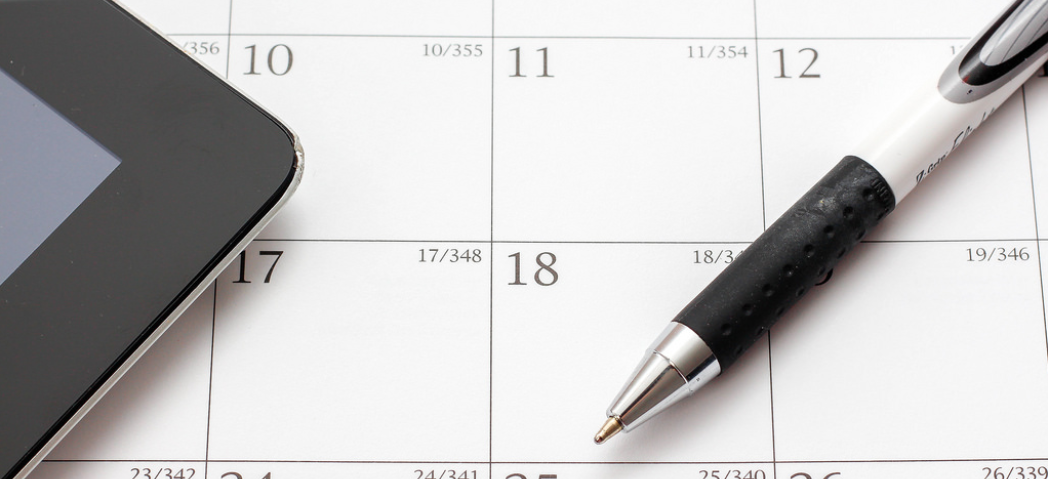calendar and pen for scheduling home building business
