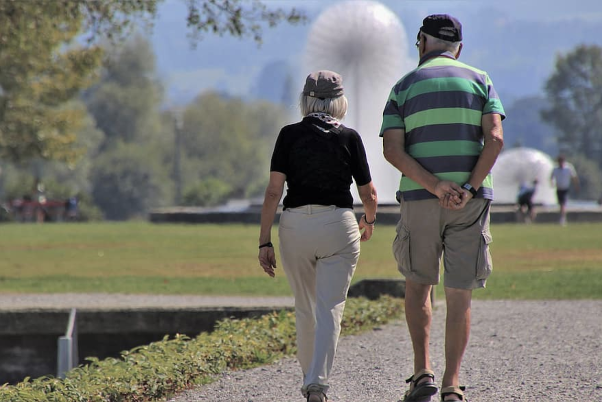 Senior couple out walking for exercise