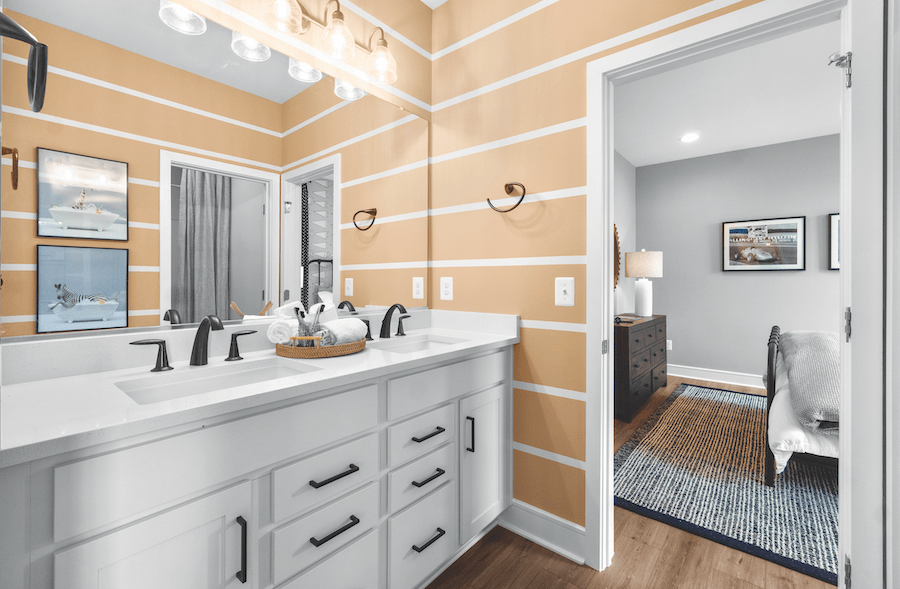 Kid-friendly homes design in action in a reimagined Jack-and-Jill bathroom.