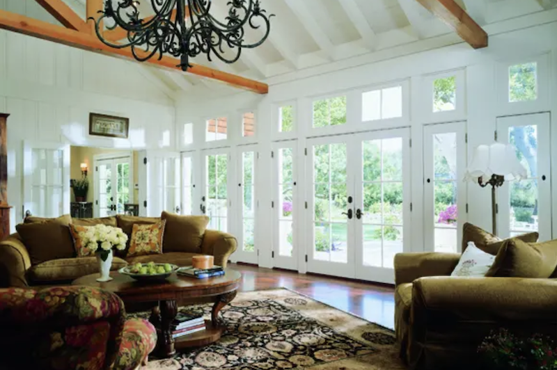 Traditional living room with French doors opening to the outside