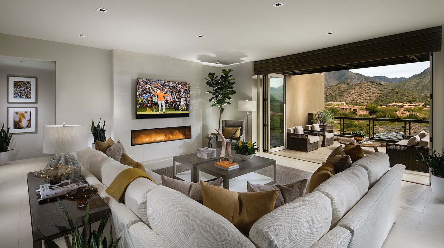 The living room at infill housing project Icon at Silverleaf has expansive desert views