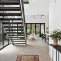 Dahlin Group's Miraval II Plan 2 interior stair with abundant natural light