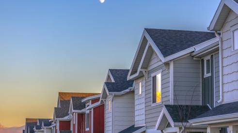 Townhomes with moon in the sky