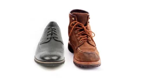 Dress shoe for office next to work boot for the construction jobsite