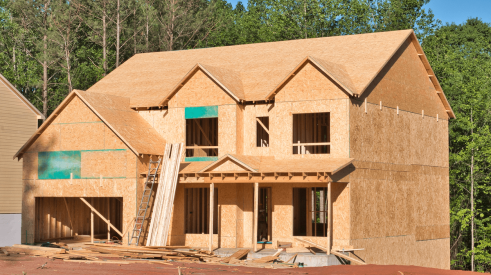 New single-family home framing under construction