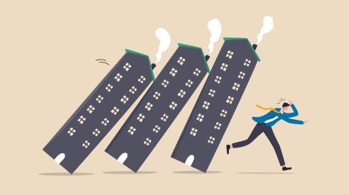 Cartoon graphic of apartment buildings falling toward businessman running away
