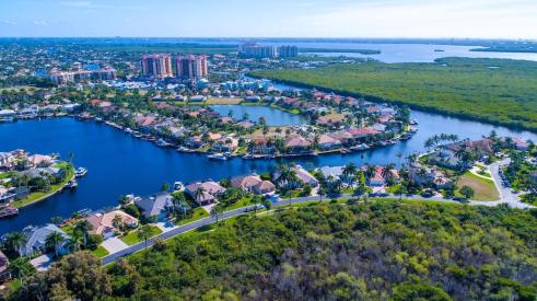 Aerial view of houses in sunny Cape Coral, Fla., where new listings are up