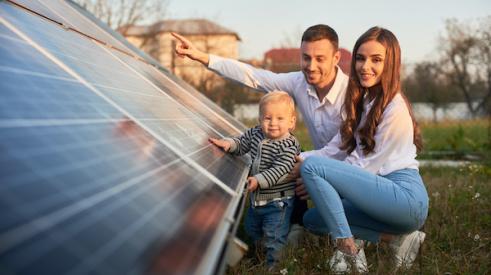 Family with solar panels on their home