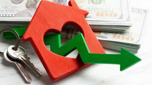 Stack of cash with small red home and flattening arrow