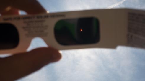 Solar glasses looking at solar eclipse