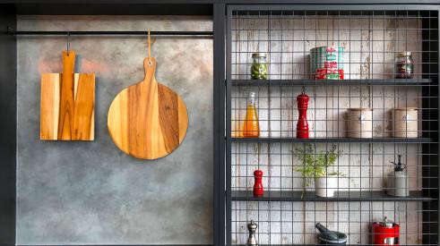Outdoor kitchen utensils on shelves