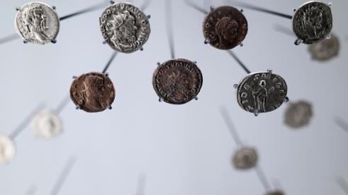 Coins on wire