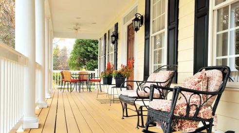 Front porch with comfortable rocking chairs 