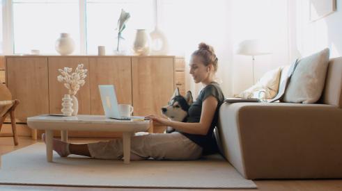 Woman working remotely in home