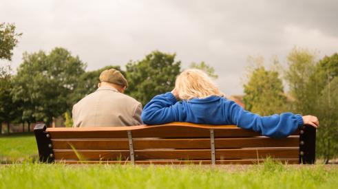 senior citizens on a bench
