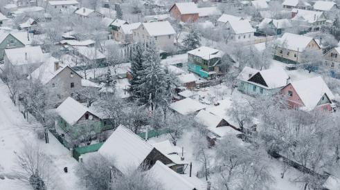 Aerial view of snowy winter houses