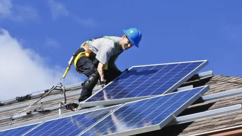 Solar energy mandates mean more work installing solar panels on rooftops