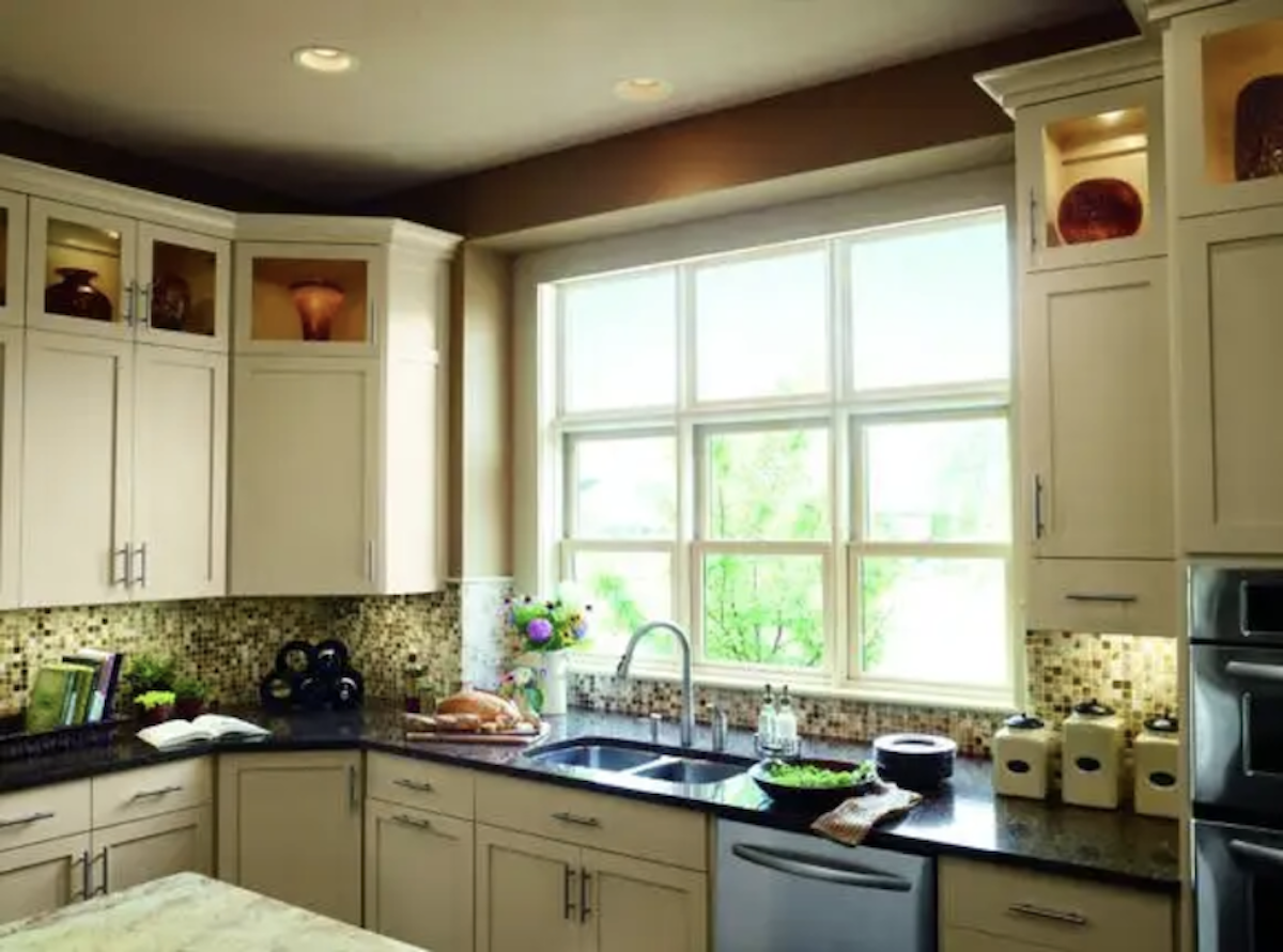 windows over kitchen sink admit plenty of natural light