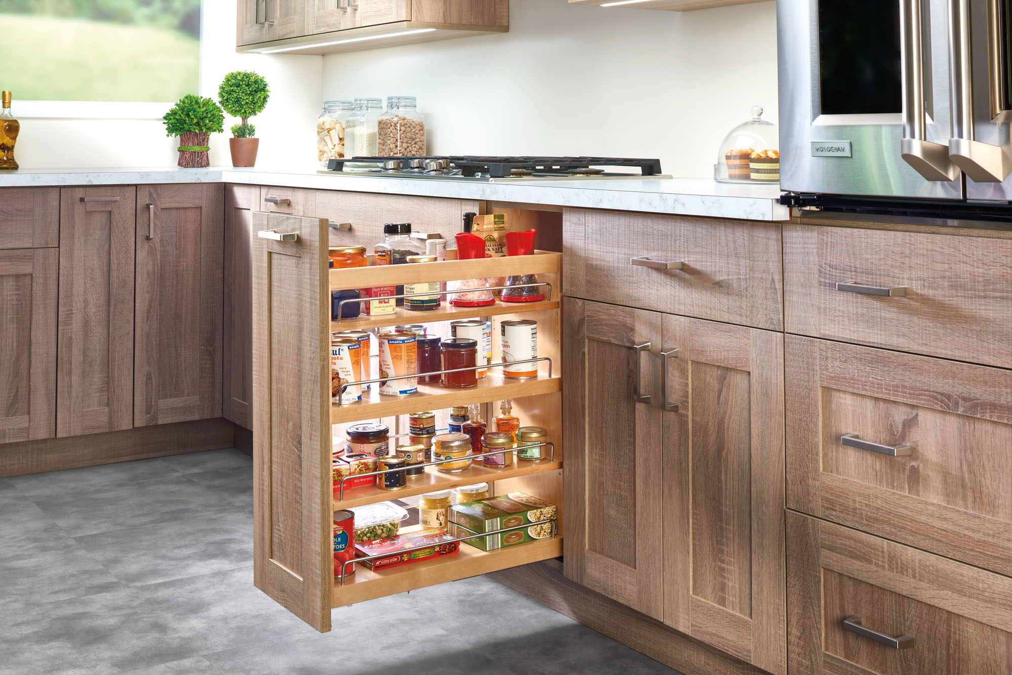 The 449 Series from Rev-A-Shelf includes the Bottom and Side Mount Soft-Close Base Organizer (shown), and the Bottom and Side Mount Soft-Close Utensil Bin Base Organizer. Featuring natural maple construction and Blum Tandem Soft-Close slides, the system is designed for 9-inch or 12-inch wide, full-height base cabinets, offers three shelf units, and is TSCA Title VI compliant.