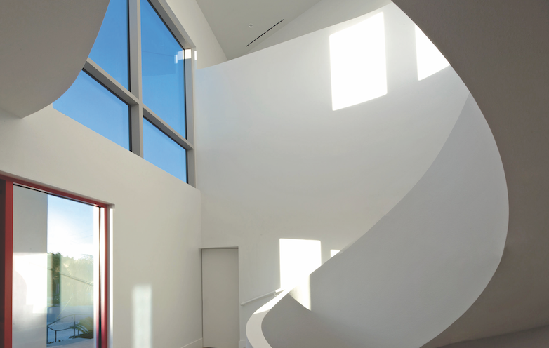 sculptural staircase design detail in a Sarasota custom home by Michael K. Walker & Associates
