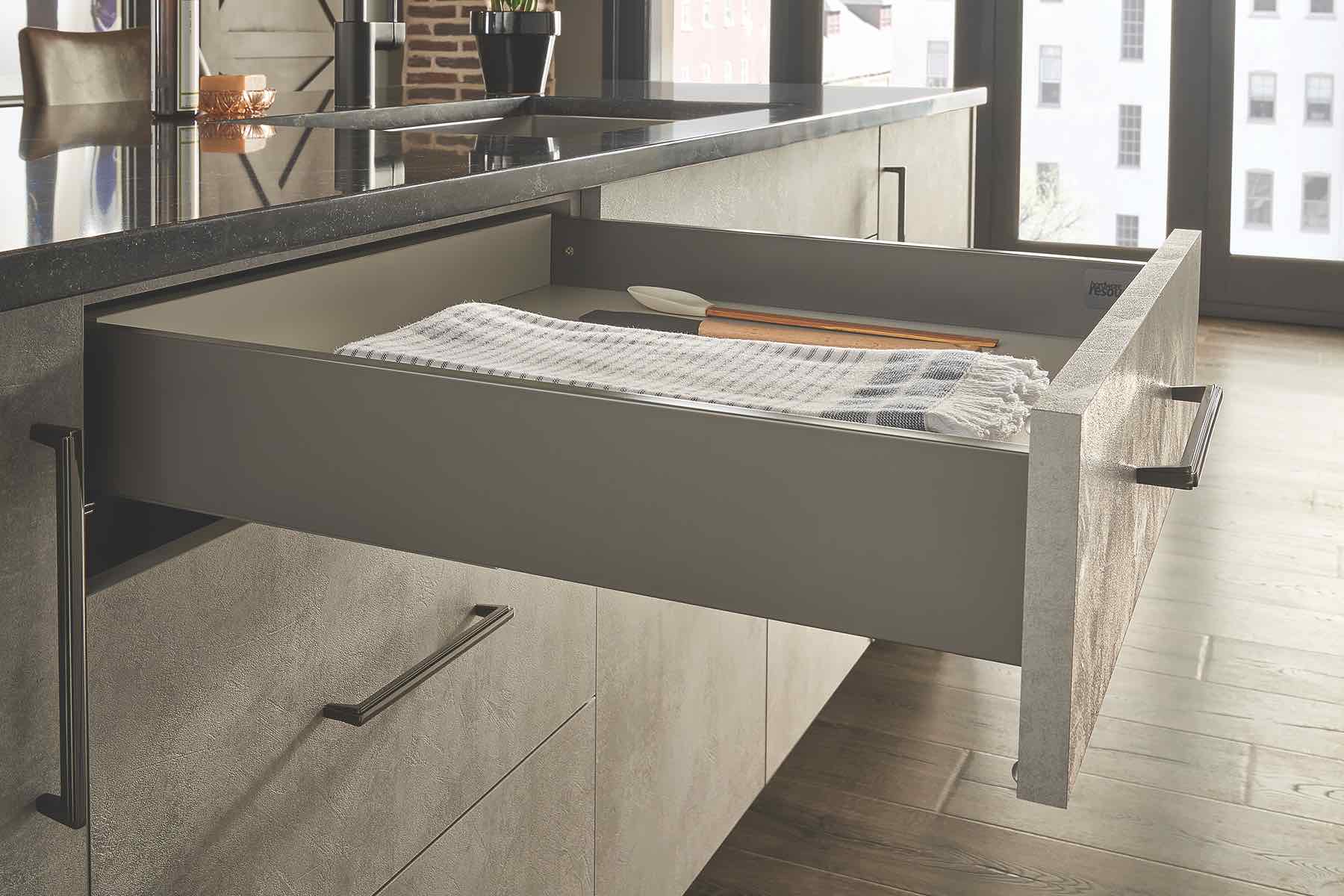 The Dura-Close cabinet drawer system from Hardware Resources can be used with frameless or face-frame cabinets. Constructed with double-wall solid steel drawer boxes, finished with slate-gray powder coat, and built on full-extension, soft-close 100-pound dynamic weight rating undermount slides, the system’s wall profile is ½ inch smaller to provide more storage space than traditional A-frame metal-drawer box systems.