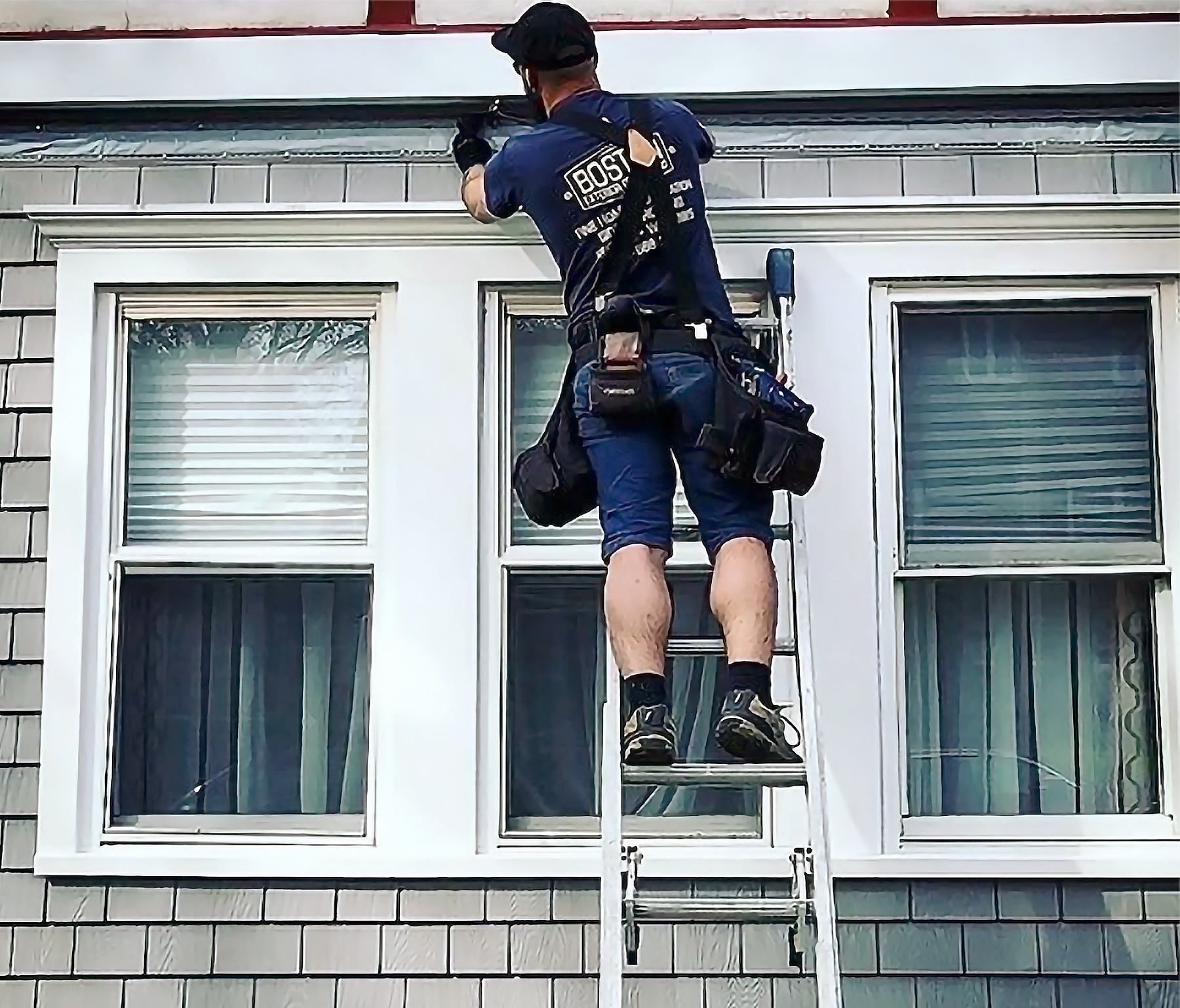 In an Instagram post, a crew member from Boston Exterior Remodeling completes a home exterior with Foundry’s Grayne Shingle Siding.