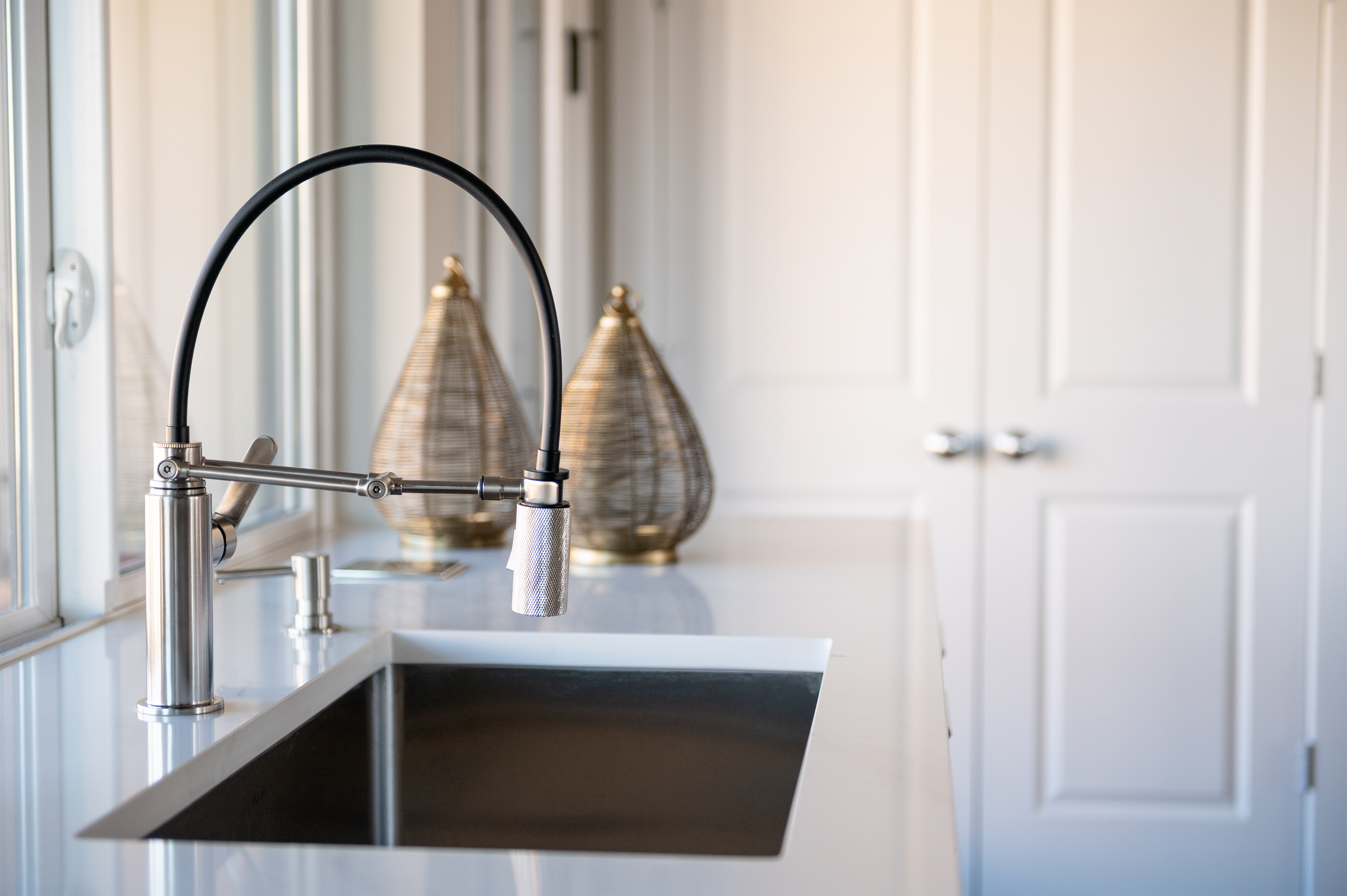 Hands-free touch faucet in the kitchen, Tri Pointe Homes