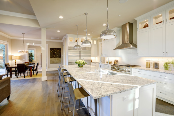 Interior of open-plan home with large kitchen island
