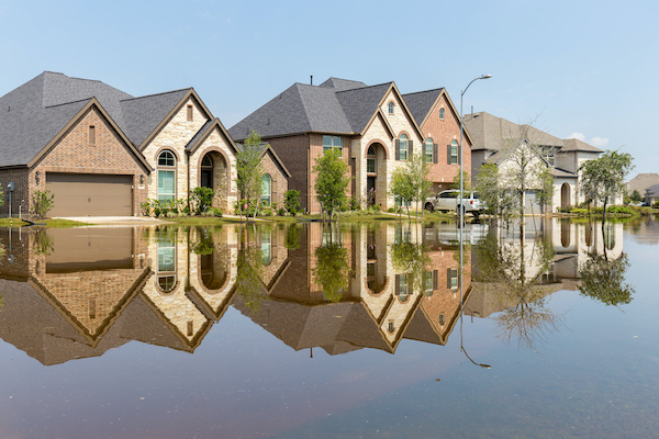 Suburban homes with extreme street flooding