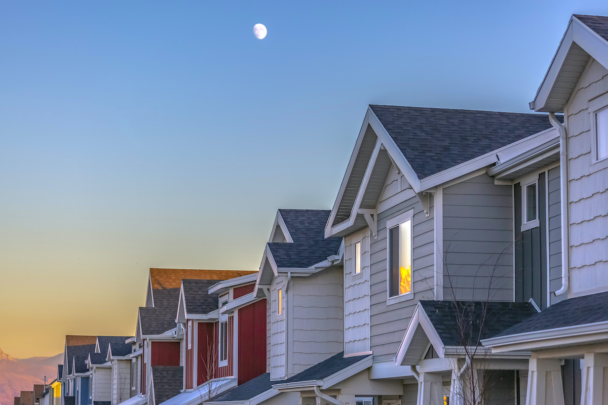 Townhomes with moon in the sky