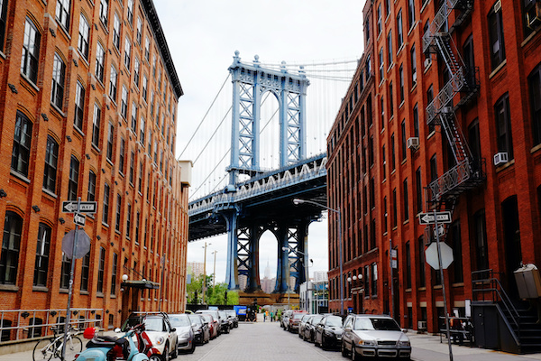 Manhattan Bridge between two New York City apartment buildings
