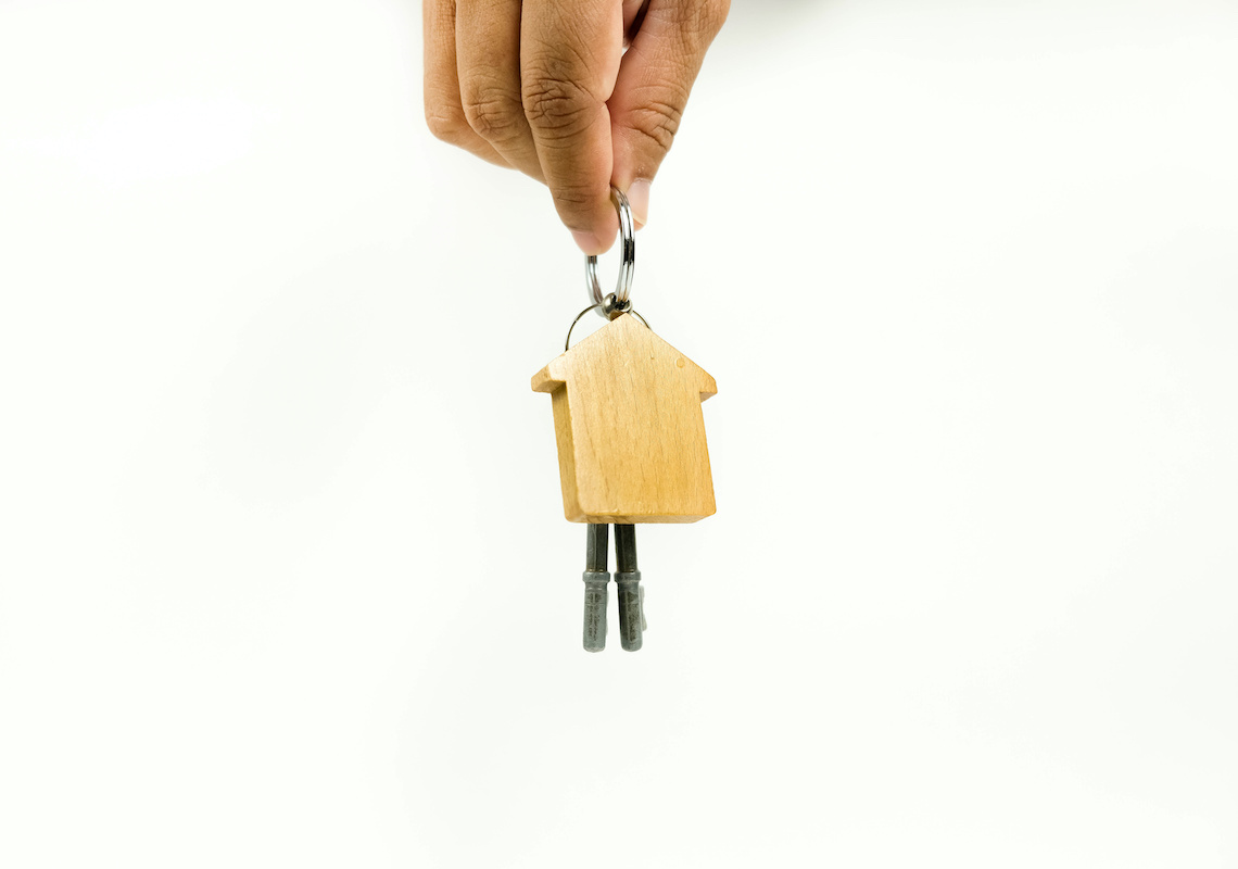 Man holding house keys