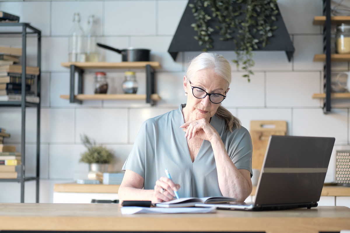 Senior woman working from home