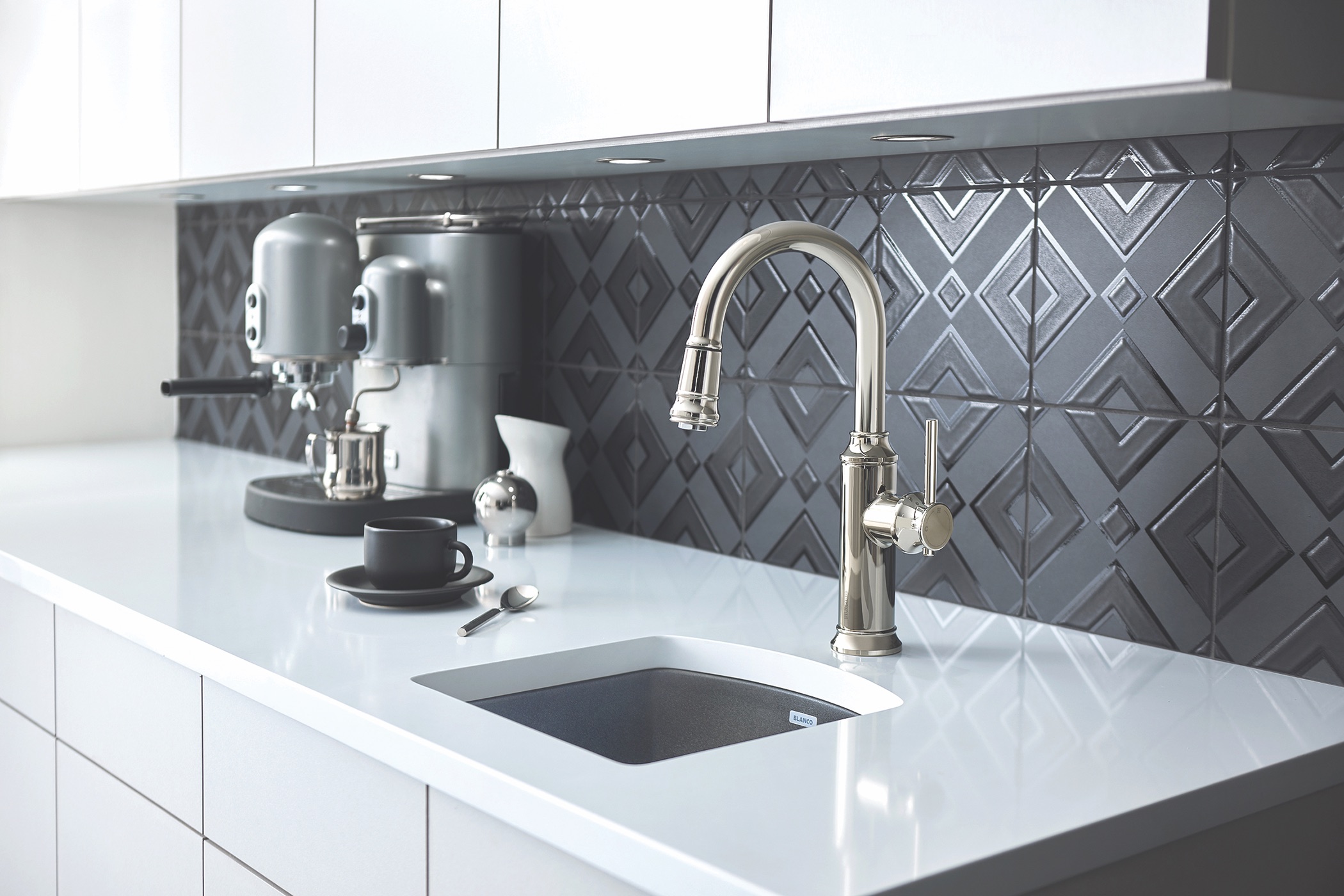 Empressa kitchen faucet collection, emphasizing silhouettes influenced by the form of vintage European wine presses