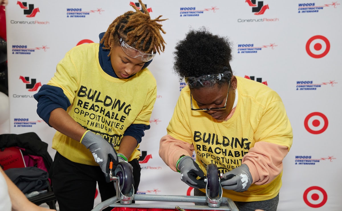 Two high school students at an 'I Built This' event 
