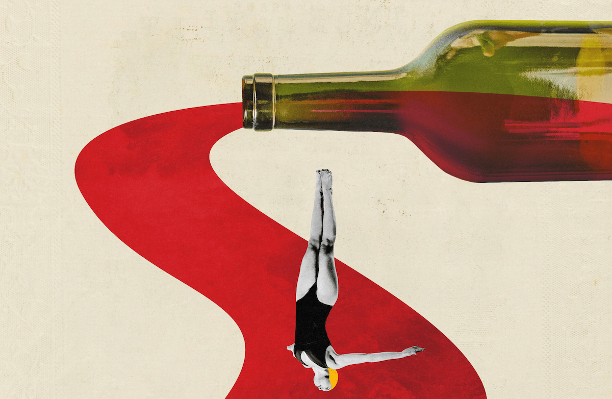 Red stream flowing out of wine bottle with swimmer diving down