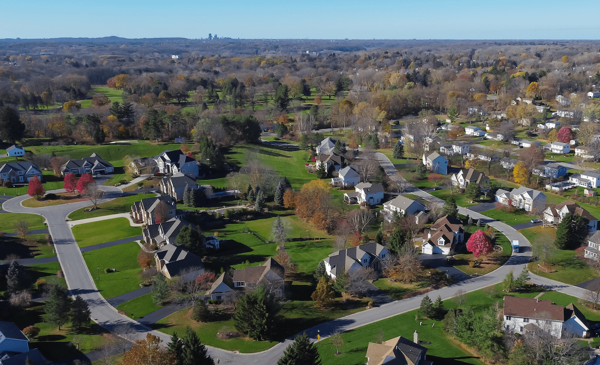 Exurban homes near Rochester, NY, with distant view of city