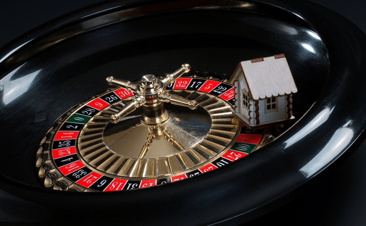 Toy house on a roulette wheel 