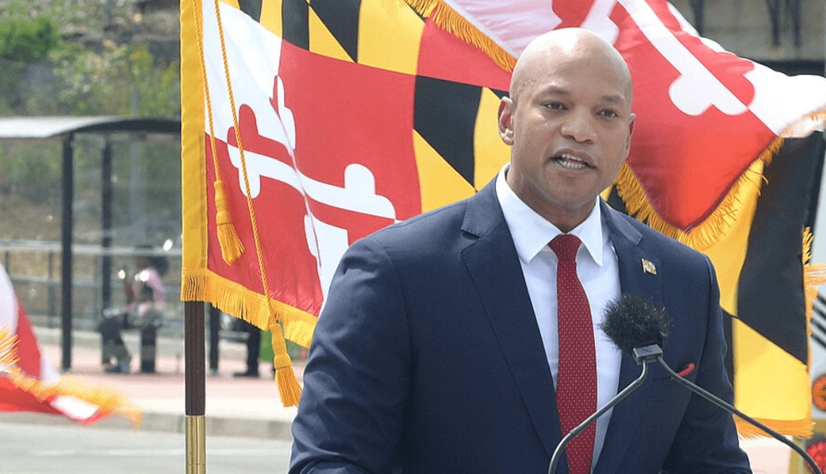 Maryland Governor Wes Moore talks to the press outdoors