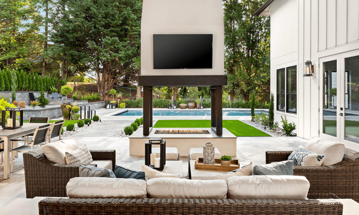 Outdoor living features that are on-trend for homebuyers include outdoor TVs like this one
