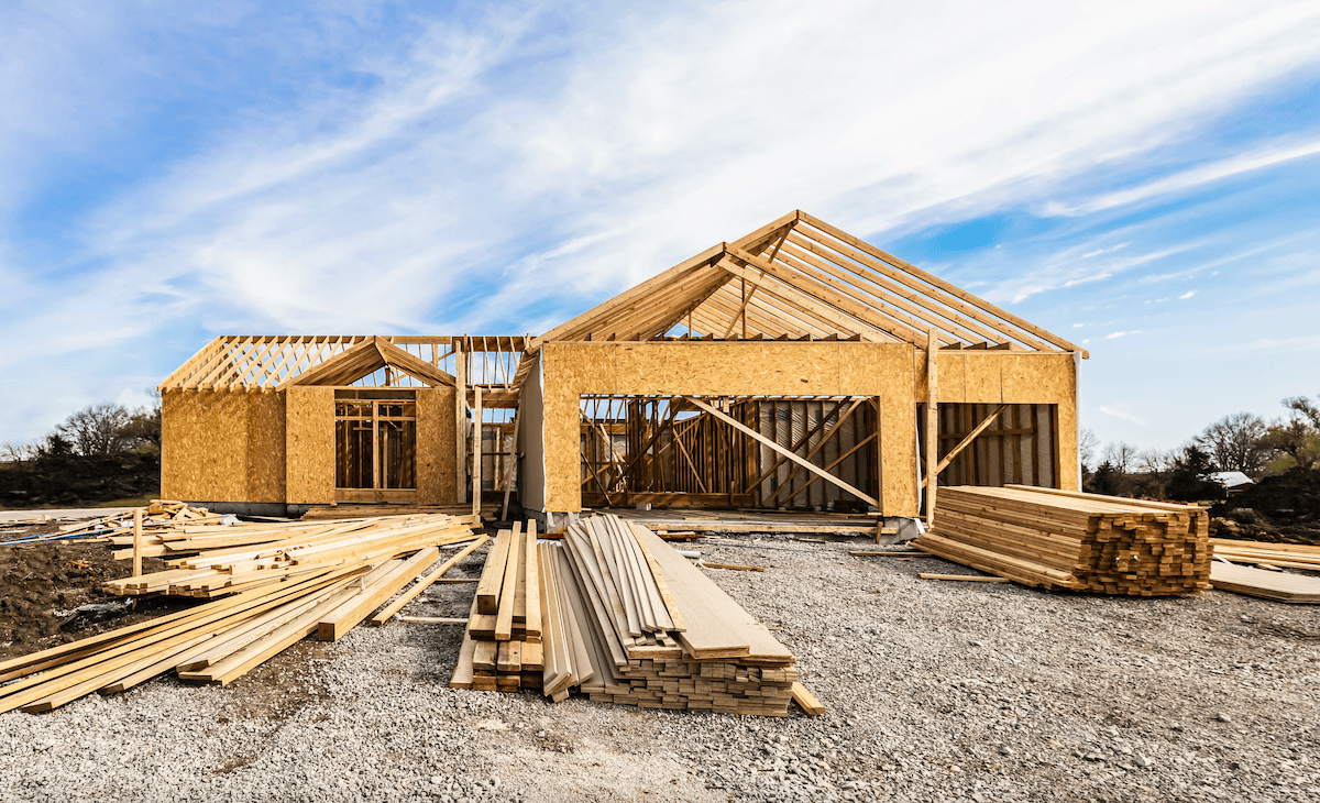 Lumber and building materials on construction site for building a new home
