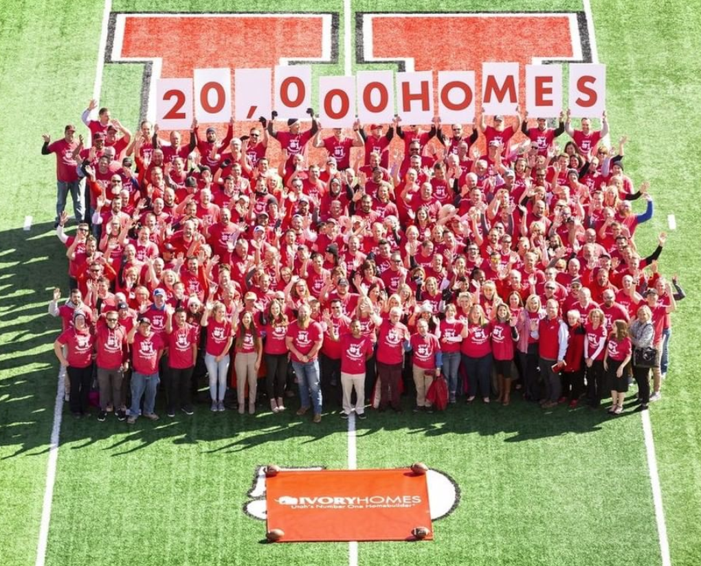 Aerial_of_Ivory_Homes_employees_with_20,000_homes_sign