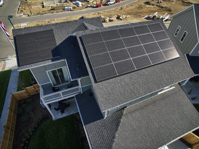 Solar panels on a net zero house roof
