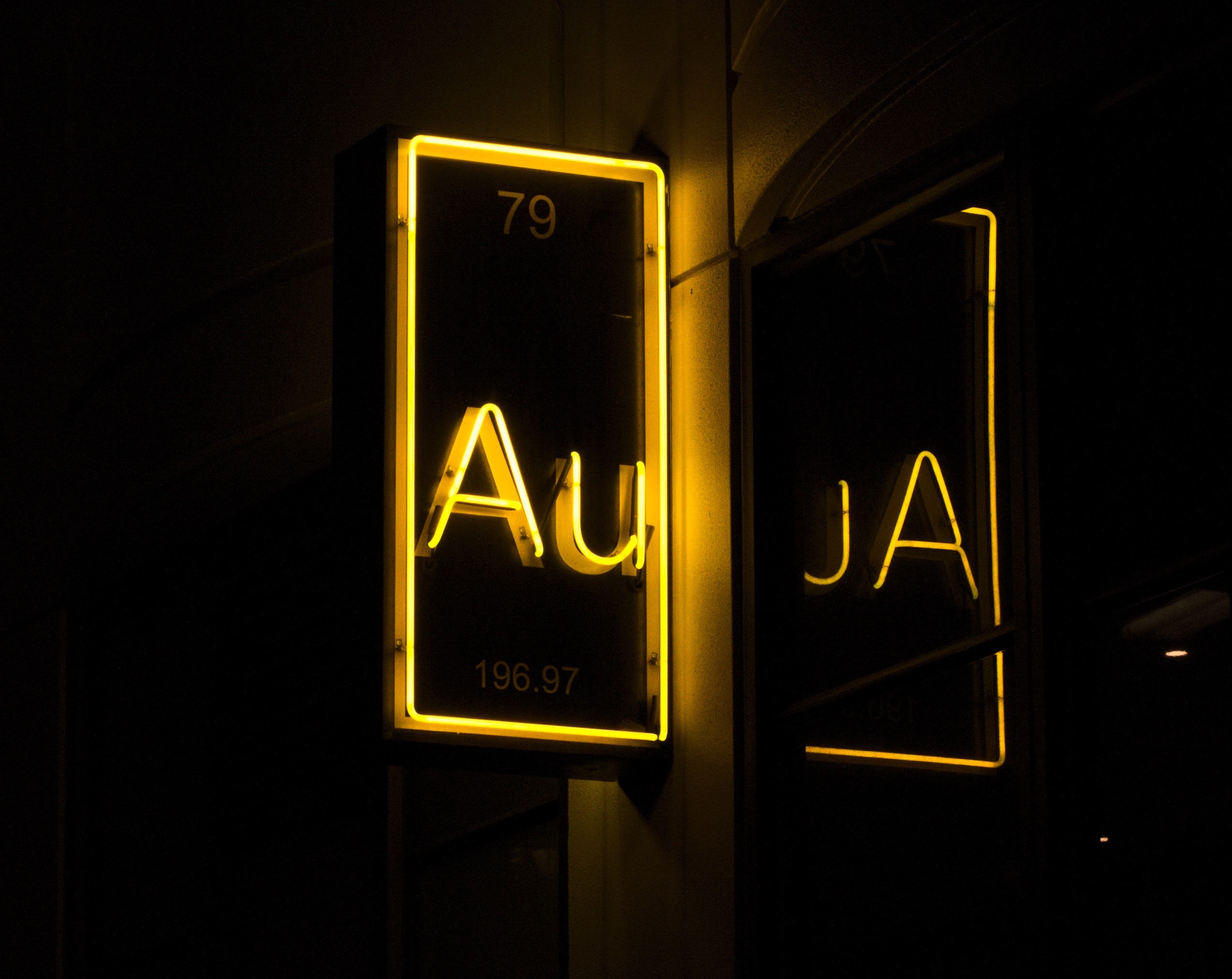 Neon sign of gold periodic table abbreviation