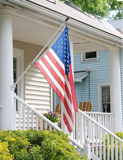 American flag on a home's front porch