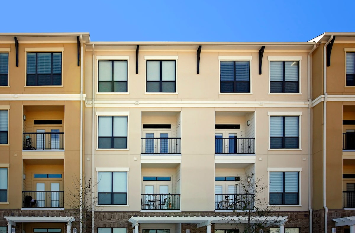 Exterior of multifamily apartment building with balconies
