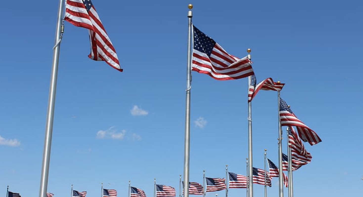 Arc of American flags on flagpoles