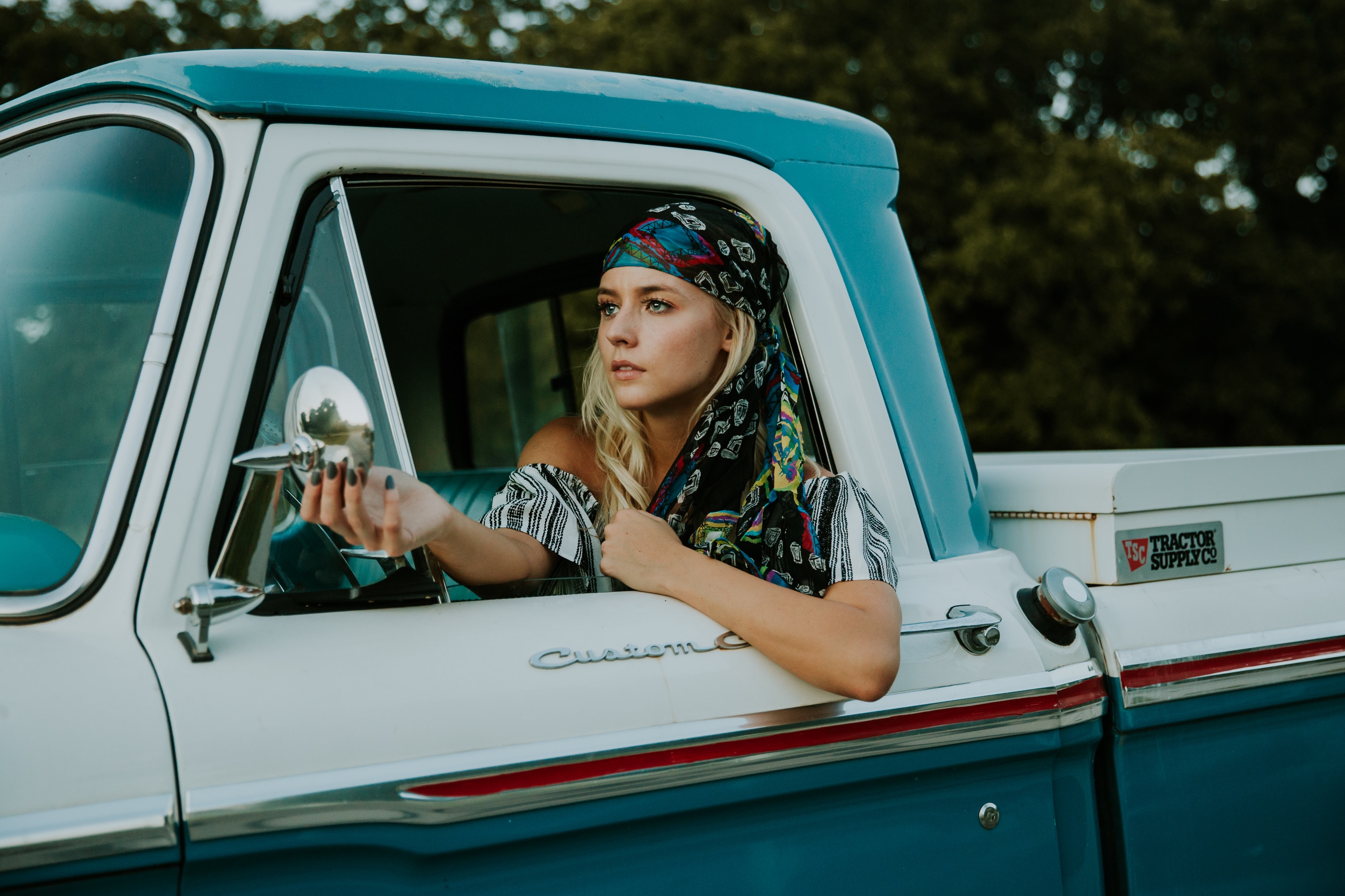 Woman driving a pickup truck